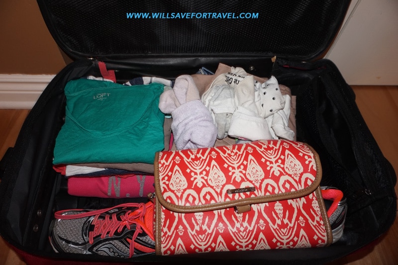 clothes folded in suitcase