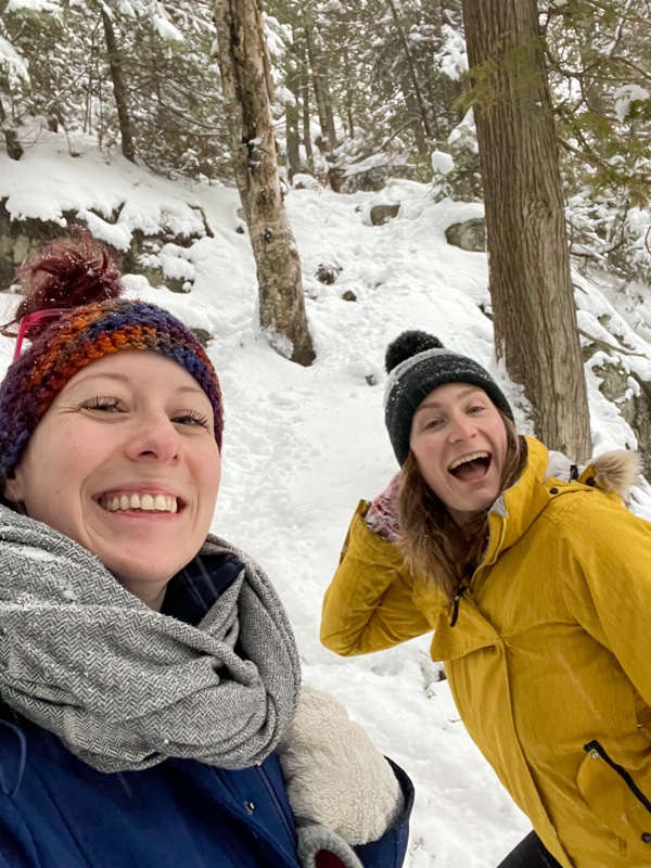 2 women hiking in the snow